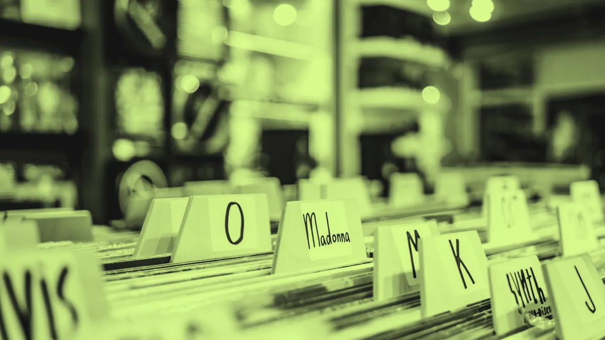 Browsing the racks in a record store.
