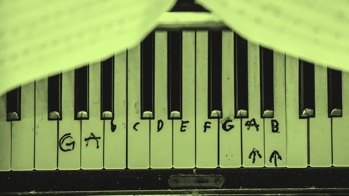 Piano keys laid out like a scale.