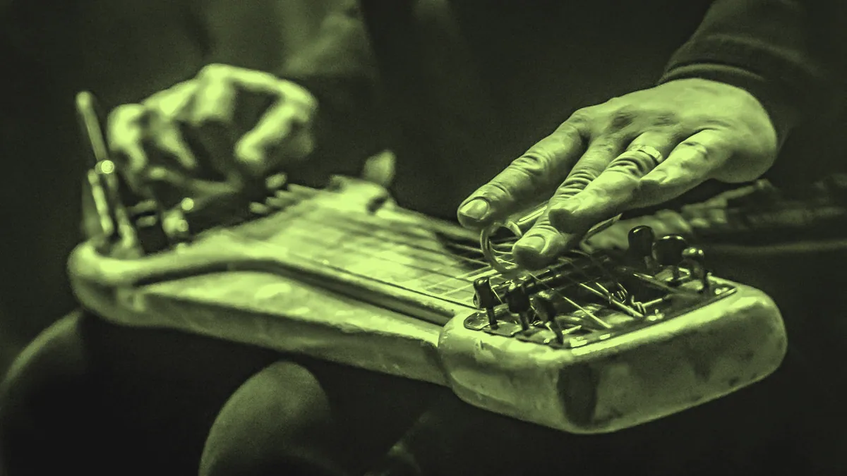 A guitar with a slide, a blues staple.